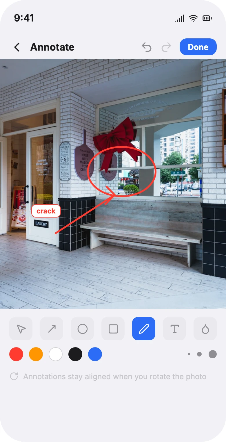 Photo annotation tools: pen, marker, lasso, eraser and text, with a circle drawn around a defect.